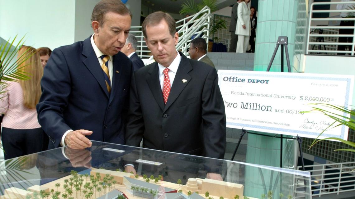 In this 2006 file photo, Modesto “Mitch” Maidique, left, then president of Florida International University, and Steve Odland, then chairman and CEO of Office Depot, view the architectural model for the FIU College of Business Administration’s planned $45 million, five-building complex.