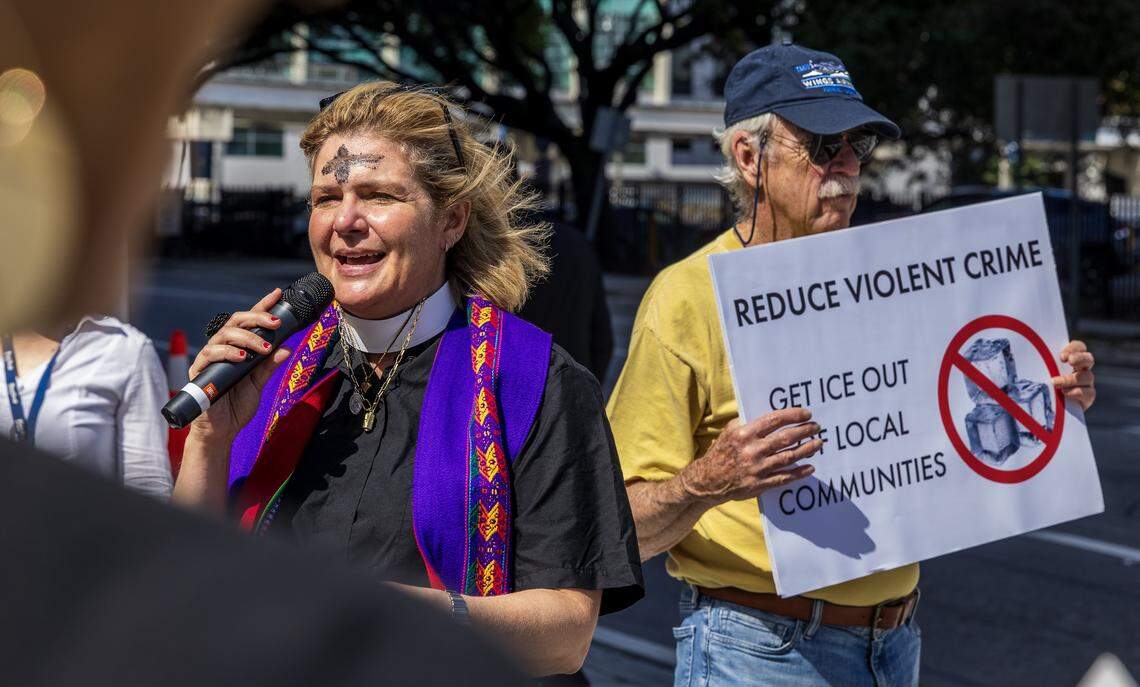 Rev. Dr. Audrey Warren, pastor of First United Methodist Church of Miami, welcomes a group of immigrants advocates ahead of a march for Immigrants beginning at First Church Miami and ending at the Immigration Court in downtown Miami, on Wednesday, February 18, 2026.