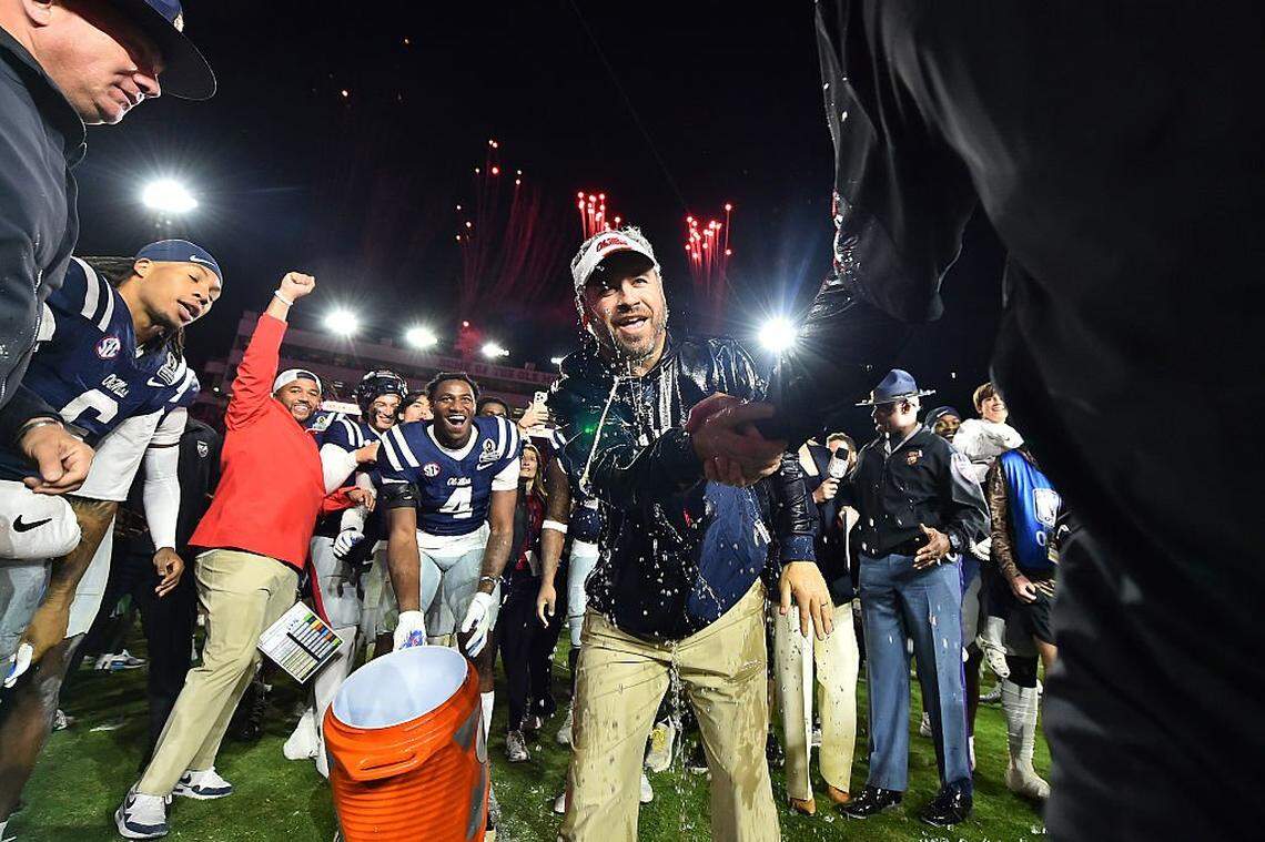 OXFORD, MISSISSIPPI - DECEMBER 20: Head coach Pete Golding of the Ole Miss Rebels is doused with water after the game against the Tulane Green Wave during the 2025 College Football Playoff First Round Game at Vaught-Hemingway Stadium on December 20, 2025 in Oxford, Mississippi. (Photo by Justin Ford/Getty Images)
