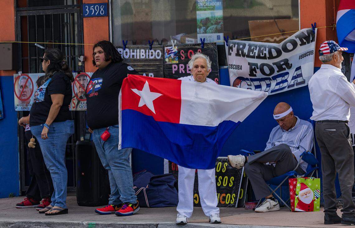 A group of Cuban exiles held a vigil in support of Venezuela at Versailles Restaurant in Miami, a day after the United States attacked Venezuela and captured leader Nicolás Maduro and his wife, Cilia Flores, on January 04, 2026.