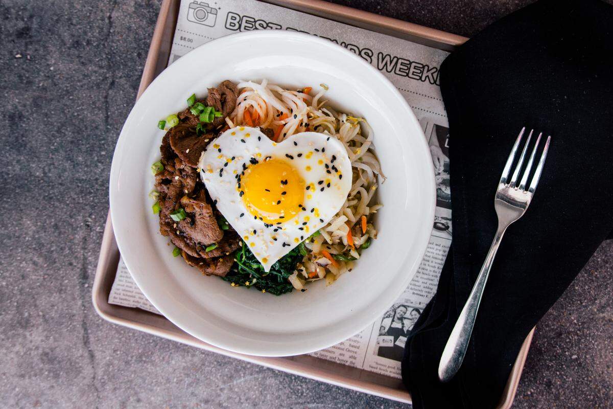 The bibimbap at 2 Korean Girls comes with a heart-shaped egg on top for your Instagramming pleasure.