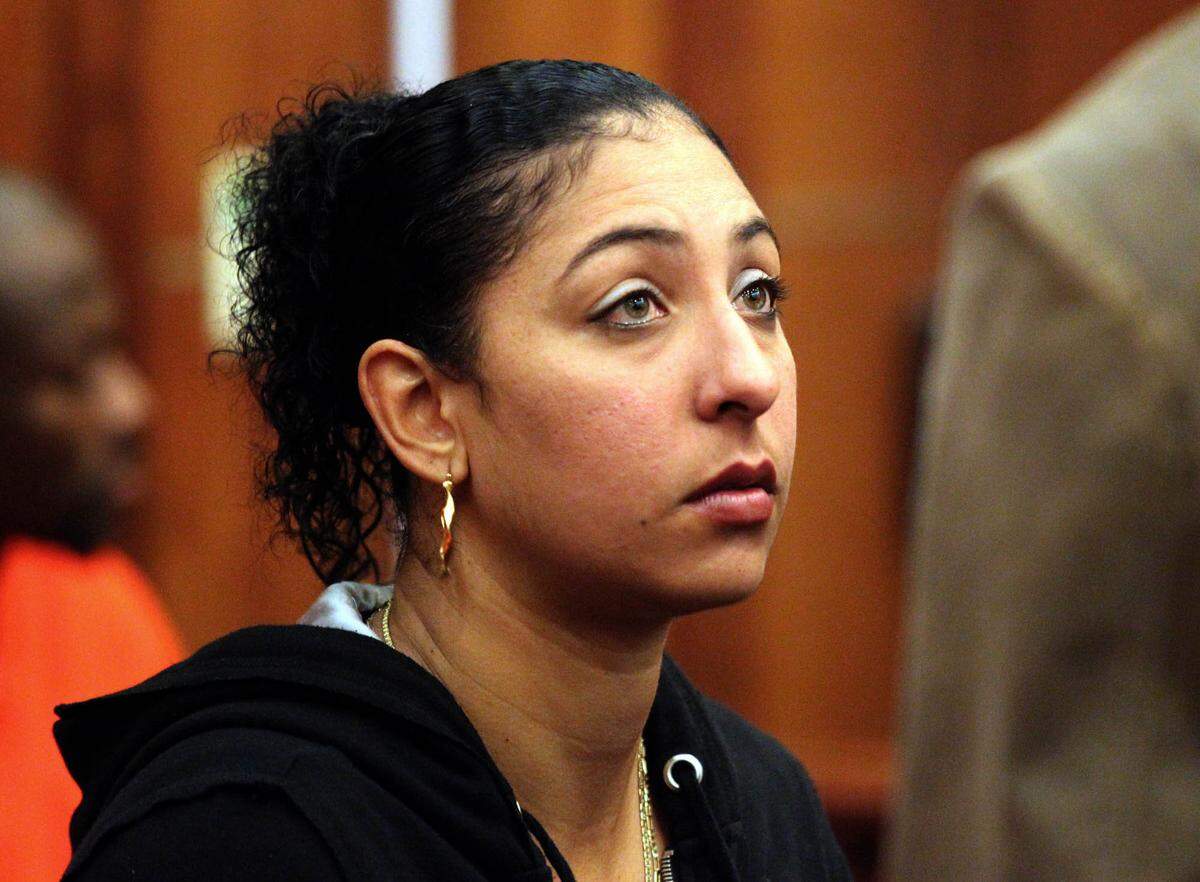 Kenia Quiala Bosque, the young mother accused of attempting to sell her 8 month old infant, sits at her arraignment in the Dade County Courts with Judge Lisa Walsh presiding over her case on January 6, 2012.