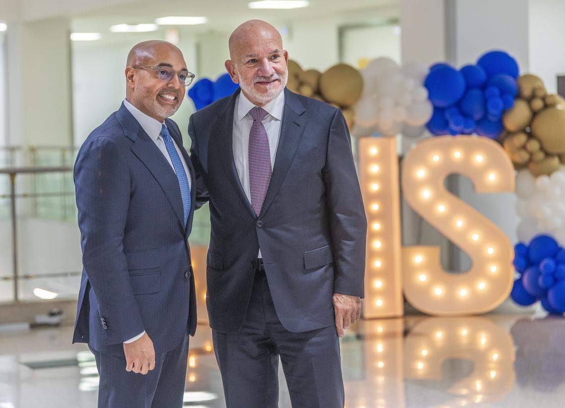Jackson Health System’s CEO Carlos Migoya (right) and his successor David Zambrana, Jackson’s president and chief operating officer, who has worked with him for more than six years, posed together after Migoya announced he is stepping down after more than a decade of leading one of the largest public health systems in the nation, on Thursday, Jan. 29, 2026.