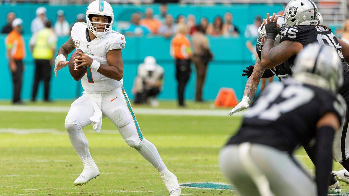 Miami Dolphins quarterback Tua Tagovailoa (1) looks to pass the ball in the fourth quarter of an NFL game against the Las Vegas Raiders at Hard Rock Stadium on Sunday, Nov. 19, 2023, in Miami Gardens, Fla.