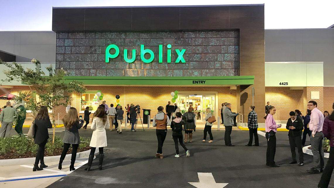 Early-morning shoppers gathered on Dec. 6, 2018, as Publix opened its first supermarket on a main college campus at the University of South Florida in Tampa.