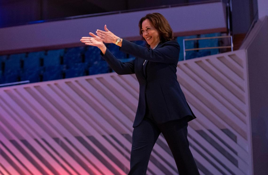 Vice President Kamala Harris reacts after being introduced by Gloria Estefan during the Aspen Ideas: Climate conference at the New World Center on Wednesday, March 8, 2023, in Miami Beach, Fla.