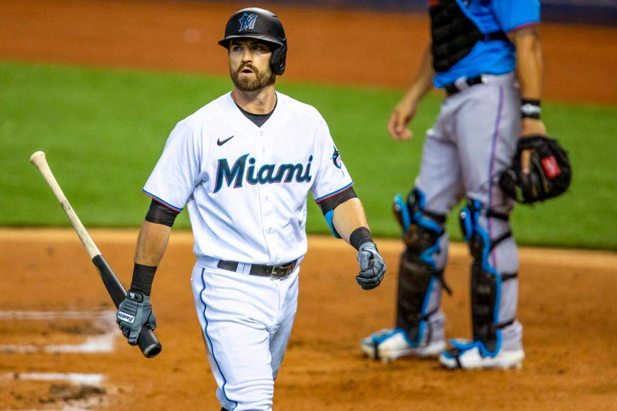Marlins short stop Jon Berti walks to the dugout after striking out during a simulation game at Marlins Park in Miami, Florida on Friday, July 10, 2020.