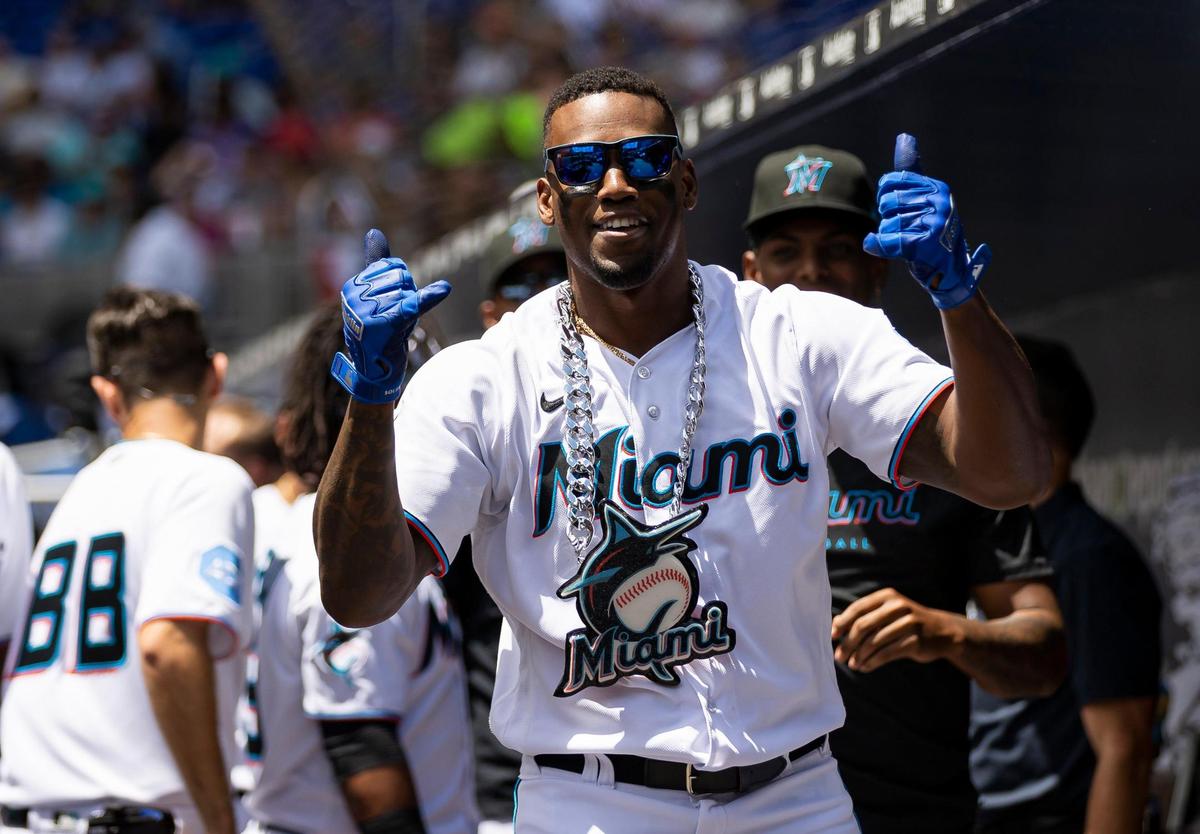 Miami Marlins left fielder Jorge Soler (12) celebrates with his teammates after scoring a home run against the Minnesota Twins during the first inning of an MLB game at loanDepot park on Wednesday, April 5, 2023, in Miami, Fla.