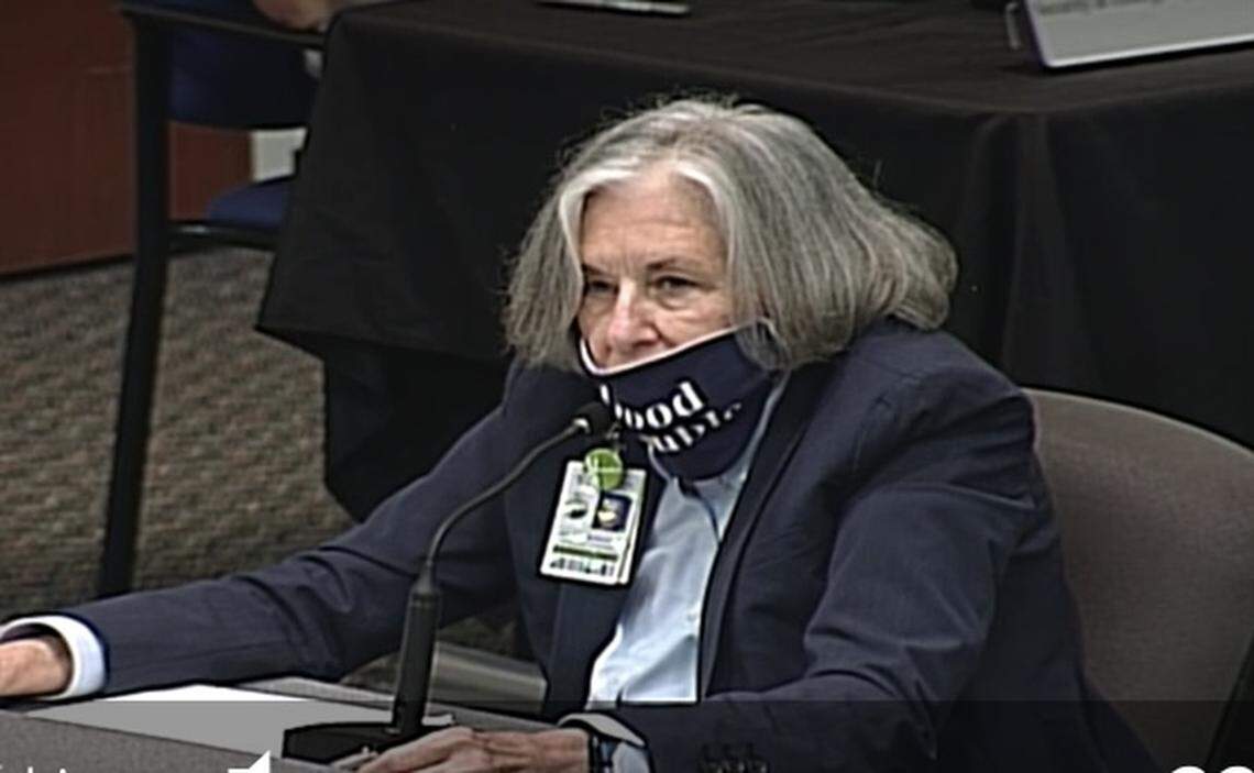 Barbara Myrick, Broward County Public Schools general counsel, talks to School Board members after they approved her separation agreement Thursday, May 5, 2021.