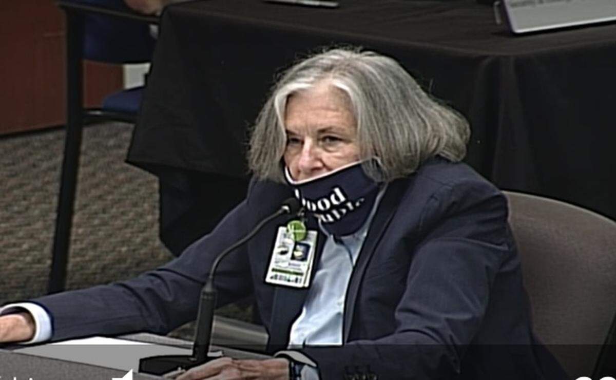 Barbara Myrick, Broward County Public Schools general counsel, talks to School Board members after they approved her separation agreement Thursday, May 5, 2021.