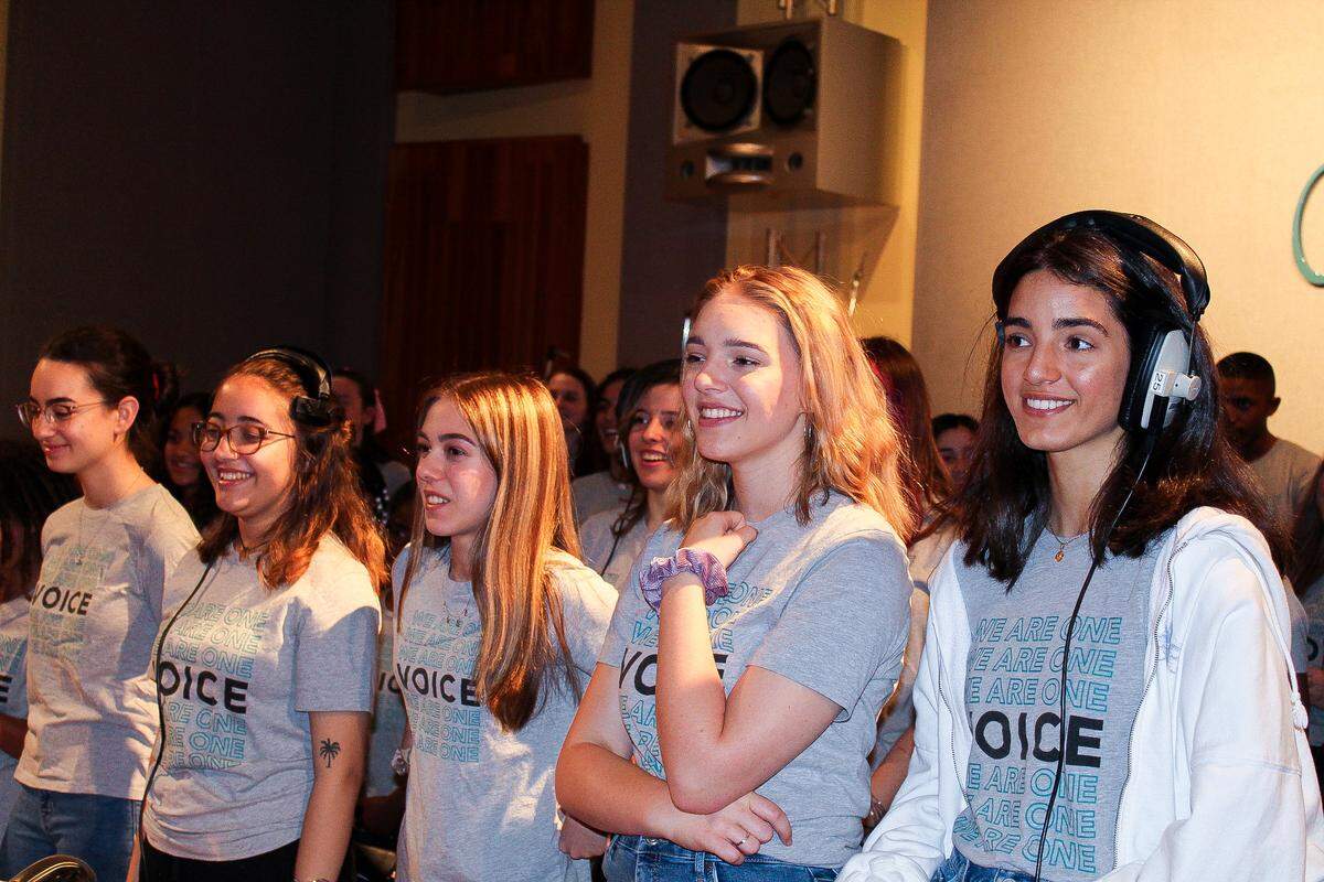 The Children’s Voice Chorus members, from left, Lisa Dias, Kayla Hincapie, Izabella Jimenez, Eden Klingbeil and Carina Rosario prepare for rehearsals. The group will be performing with gospel and R&B singer Yolanda Adams live at this year’s Super Bowl at Hard Rock Stadium.