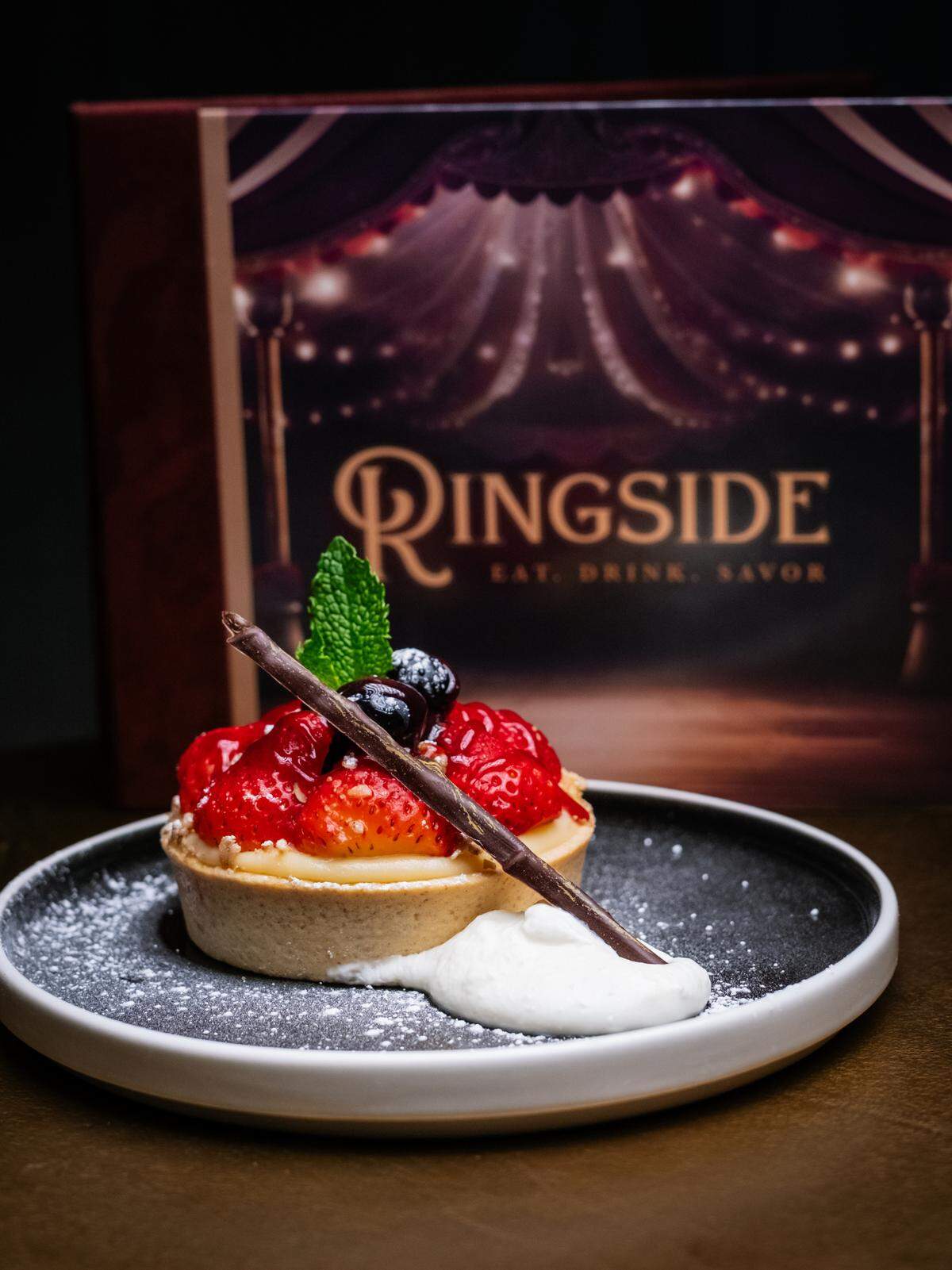 Private dining nooks channel vintage circus railcars, while sunset views and delicious dishes steal the show.