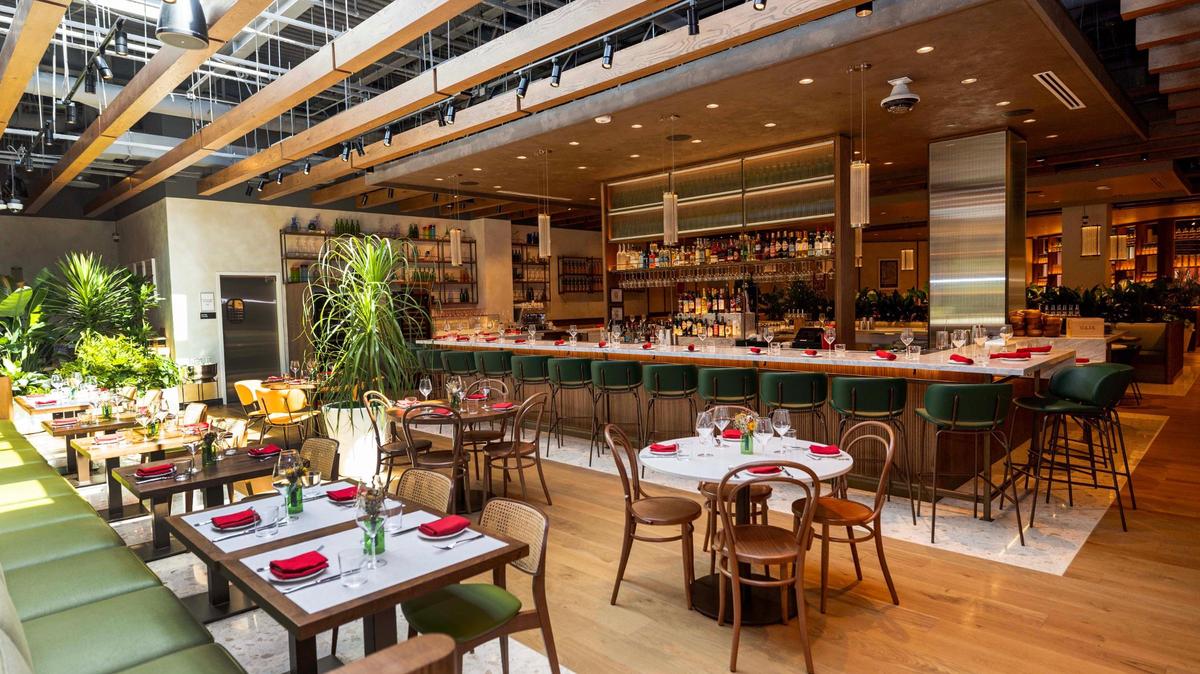 The dining area and bar of the La Pizza & La Pasta restaurant inside Eataly at the Aventura Mall.