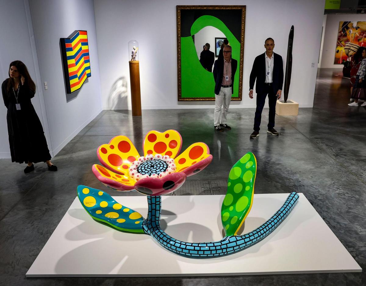 ‘Flowers That Bloom Now’ by Yayoi Kusama is presented by Lévy Gorvy Dayan’ during Art Basel at the Miami Beach Convention Center on Wednesday, Dec. 4, 2024, in Miami Beach, Fla.