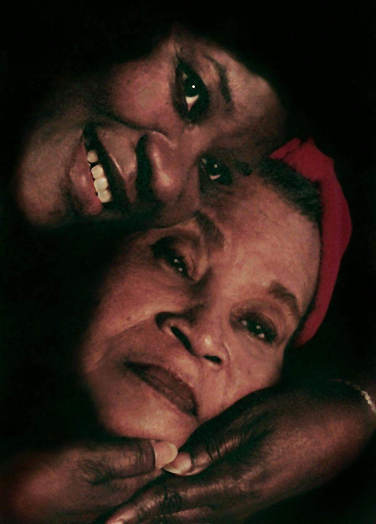In this 1999 photo, Miami Herald reporter Bea Hines cares for her mother, Ida Belle Johnson, 80.