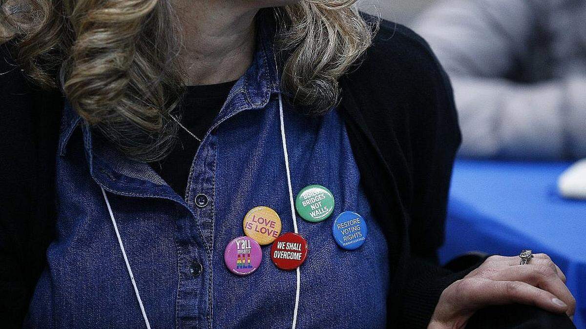 A member of the Sisterhood of Salaam Shalom group in Selma, Alabama, expesses her beliefs through her buttons.