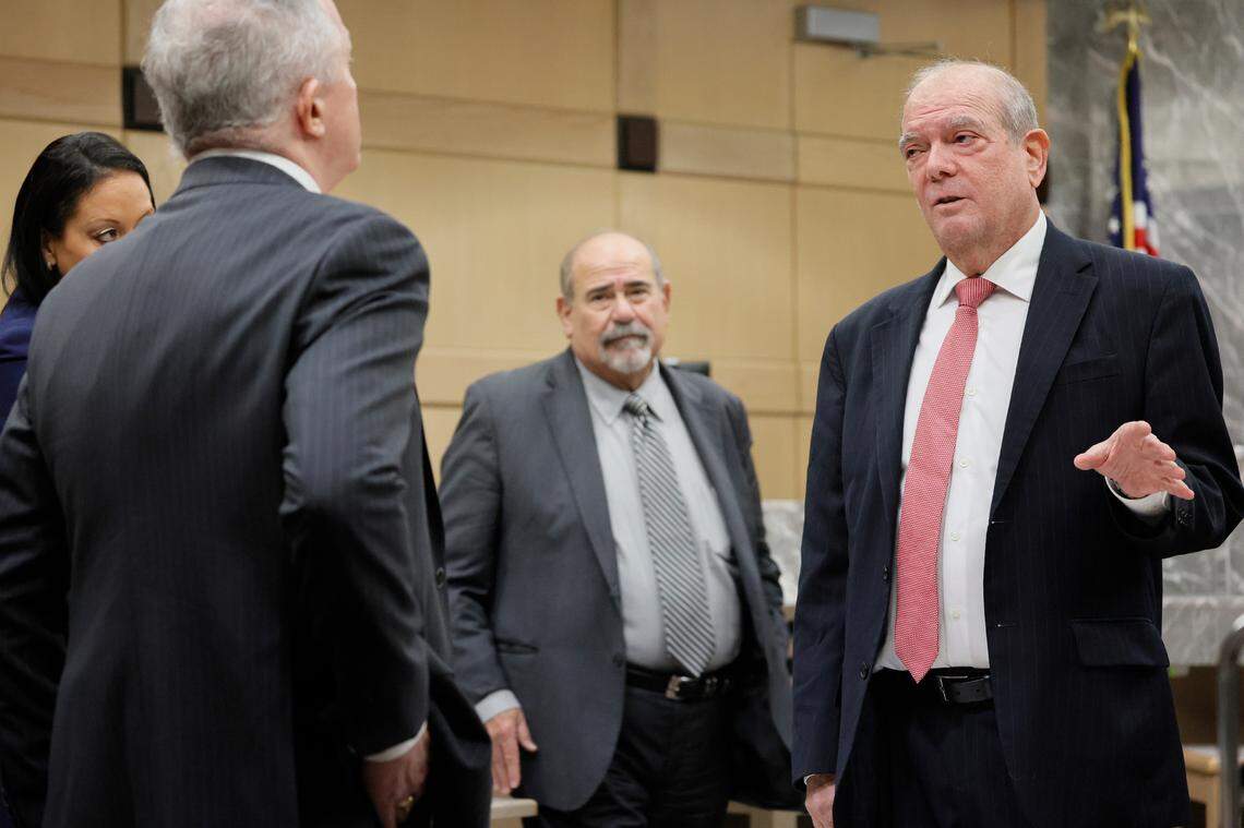 Defense attorneys, from right; Daniel Aaronson, Jamie Benjamin, and Raven Ramona Liberty speak with prosecutor Steven Klinger, second from left, before the start of a hearing in preparation for the trial of Jamell Demons, better known as rapper YNW Melly, at the Broward County Courthouse in Fort Lauderdale on Friday, Oct. 13, 2023. Demons is accused of killing two fellow rappers and conspiring to make it look like a drive-by shooting in October 2018.