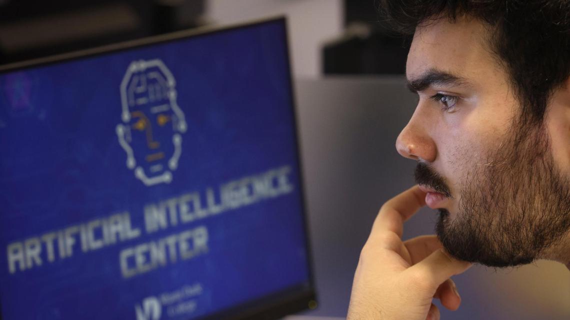 Oswaldo Godoy works with ChatGPT3 during an artificial intelligence class working to create an AI to look for literary devices in the Harry Potter novels on Monday, March 6, 2023, at the Miami Dade College North Campus.