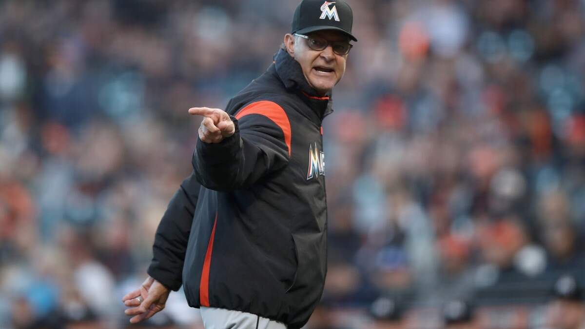 SAN FRANCISCO, CA - JUNE 19:  Manager Don Mattingly of the Miami Marlins argues with umpires Laz Diaz and Andy Fletcher after Dereck Rodriguez #57 of the San Francisco Giants hit Lewis Brinson #9 of the Miami Marlins in the second inning at AT&T Park on June 19, 2018 in San Francisco, California.  (Photo by Ezra Shaw/Getty Images)