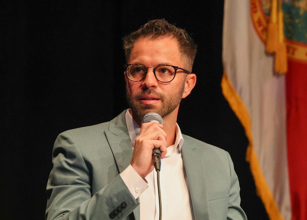 Reuben Rojas, Resettlement Outreach Regional Manager for Church World Service, speaks during a panel about immigration on Thursday, Feb. 23, 2023, at Miami Dade College Wolfson Campus Auditorium.
