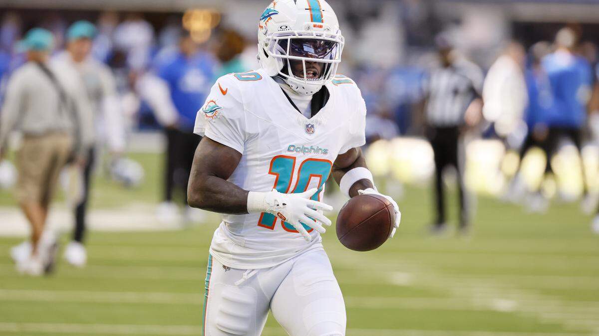 Miami Dolphins wide receiver Tyreek Hill (10) warms up before an NFL game against the Indianapolis Colts at Lucas Oil Stadium on Sunday, Sept. 7, 2025, in Indianapolis.