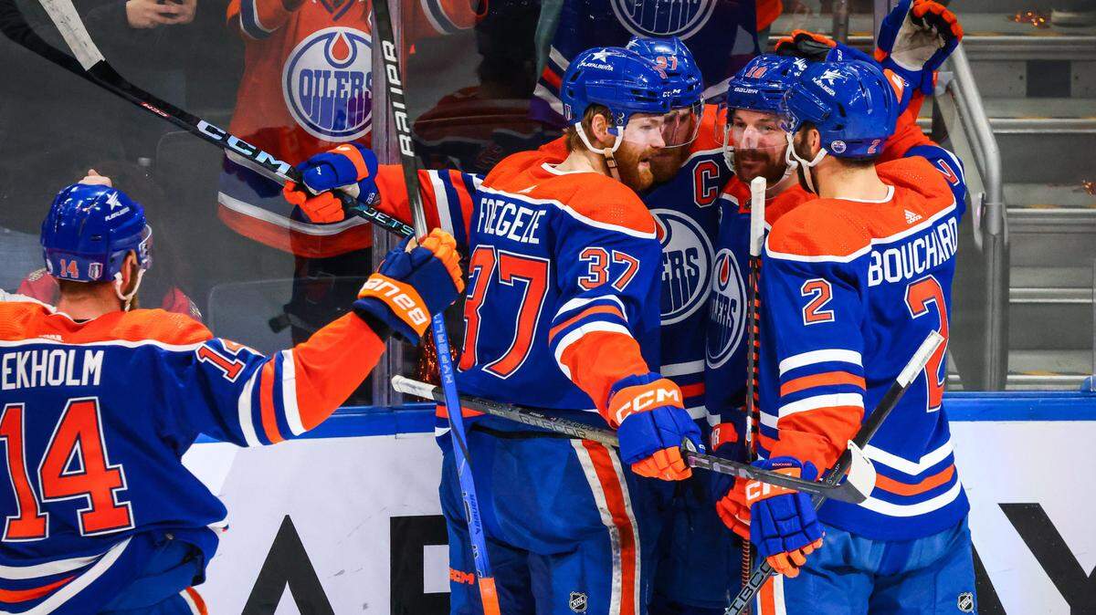 Jun 15, 2024; Edmonton, Alberta, CAN; Edmonton Oilers center Connor McDavid (97) celebrates his goal with teammates against the Florida Panthers during the second period in game four of the 2024 Stanley Cup Final at Rogers Place. Mandatory Credit: Sergei Belski-USA TODAY Sports