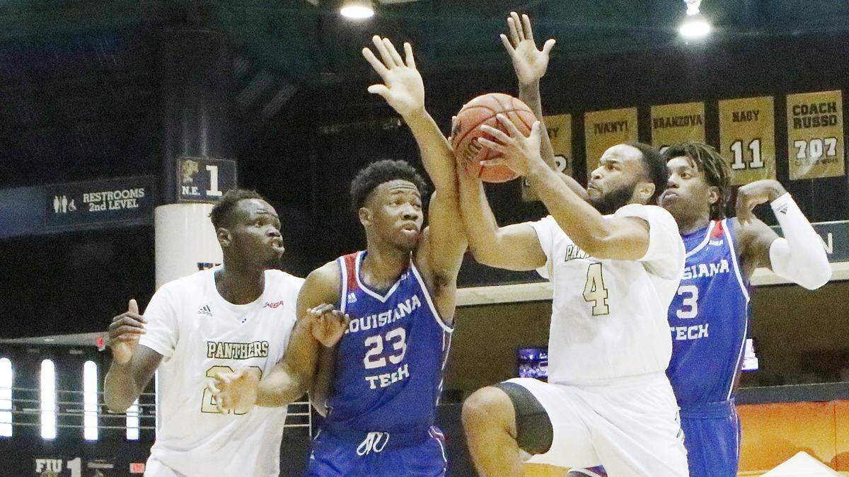 FIU Panthers’ Brian Beard, Jr. (4) goes for shoots against March 3, 2019 at FIU Ocean Bank Convocation Center. Beard led Conference USA in steals (2.9), ranked second in assists (6.0) and sixth in points (17.4).
