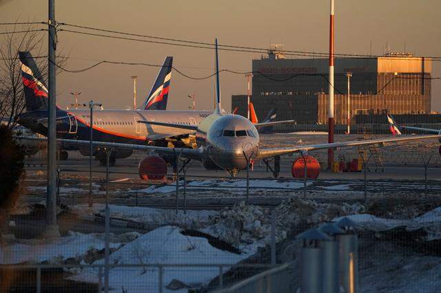 Aeroflot’s passenger planes are parked at Sheremetyevo airport, outside Moscow, Russia, Tuesday, March 1, 2022. Russia’s largest airline, Aeroflot, said Monday that it suspended flights to New York, Washington, Miami and Los Angeles because Canada has closed its airspace to Russian planes. The U.S. followed suit.