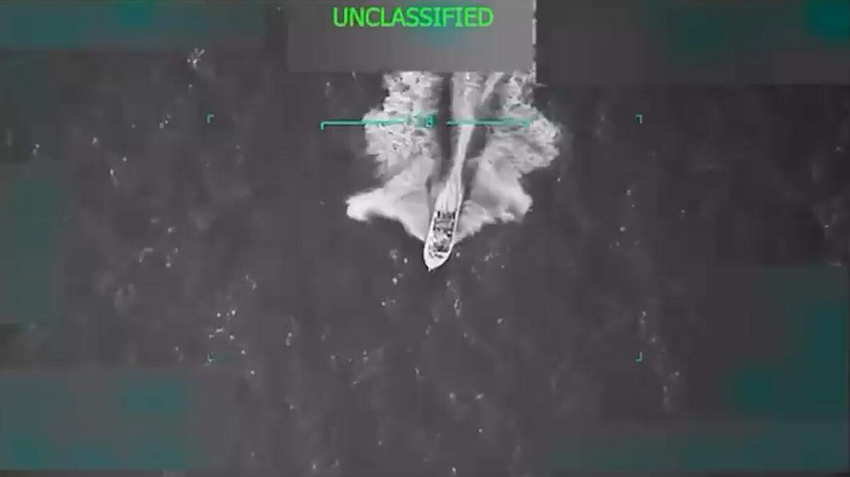 A U.S. military video released by the Department of Defense shows a precision strike destroying a high-speed narcotics vessel in international waters on Sept. 2, 2025. The footage, later shared by Trump on Truth Social, was described as targeting the Tren de Aragua criminal organization amid a U.S. naval buildup in the Caribbean.