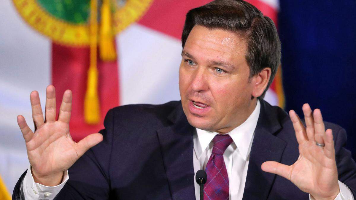 Florida Gov. Ron DeSantis, seen here during a roundtable discussion with theme park leaders about coronavirus safety protocols in 2020, vowed to fight Disney’s “special privileges” after the company opposed a parental-rights bill because of its impact on LGBTQ youth.
