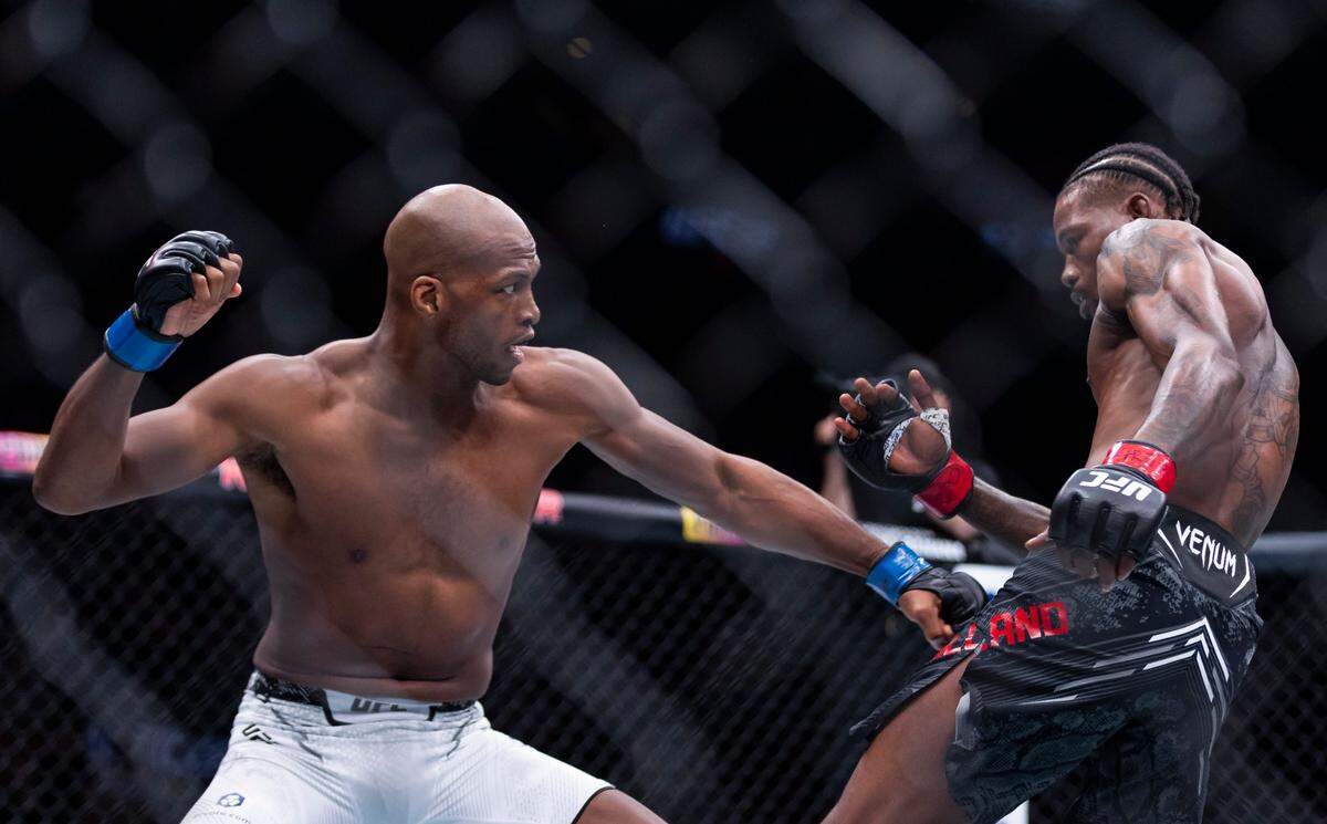 Kevin Holland of the United States fights against Michael Page of England during their welterweight title match during the UFC 299 event at the Kaseya Center on Saturday, March 9, 2024, in downtown Miami, Fla.