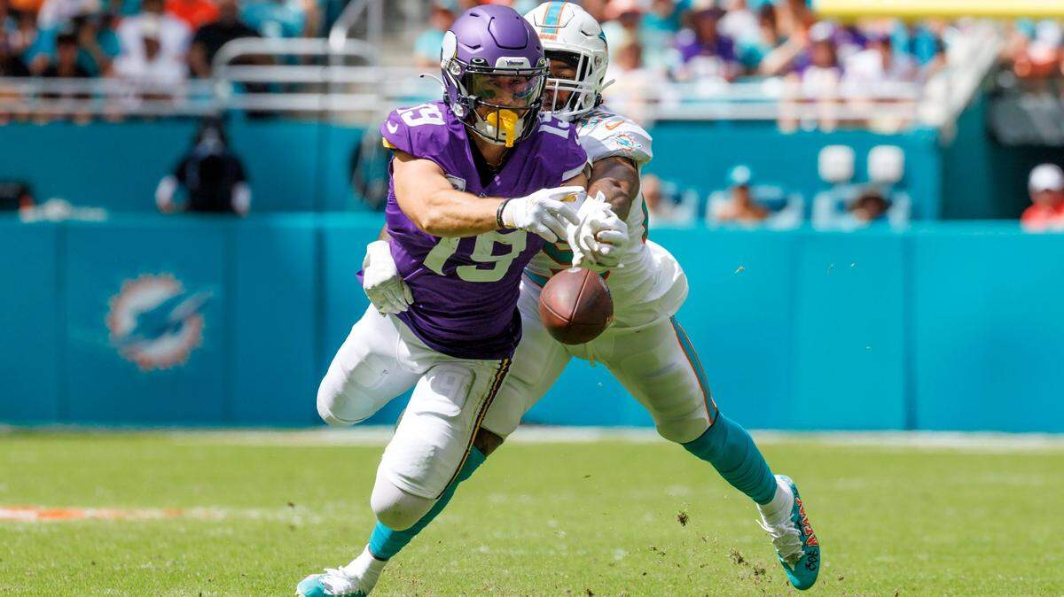 Miami Dolphins cornerback Xavien Howard (25) breaks a pass intended to Minnesota Vikings wide receiver Adam Thielen (19) during first quarter of an NFL football game at Hard Rock Stadium on Sunday, October 16, 2022 in Miami Gardens, Florida.