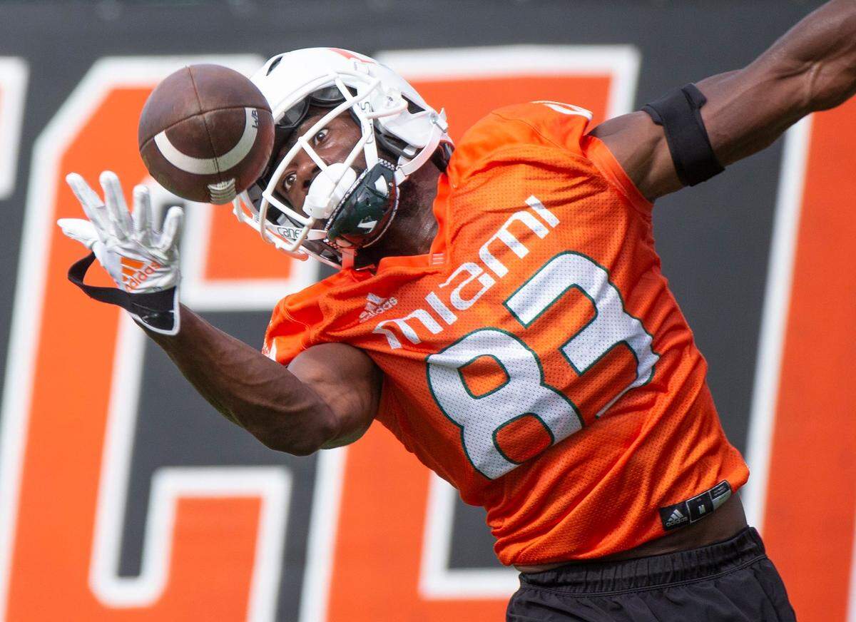 Miami Hurricanes wide receiver Michael Redding III (83) on a one handed catch during practice drills at Greentree Practice Field at the University of Miami in Coral Gables on Friday, August 5, 2022.