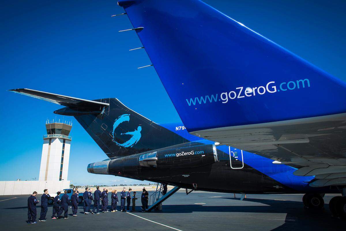 Passengers board the Zero-G plane.