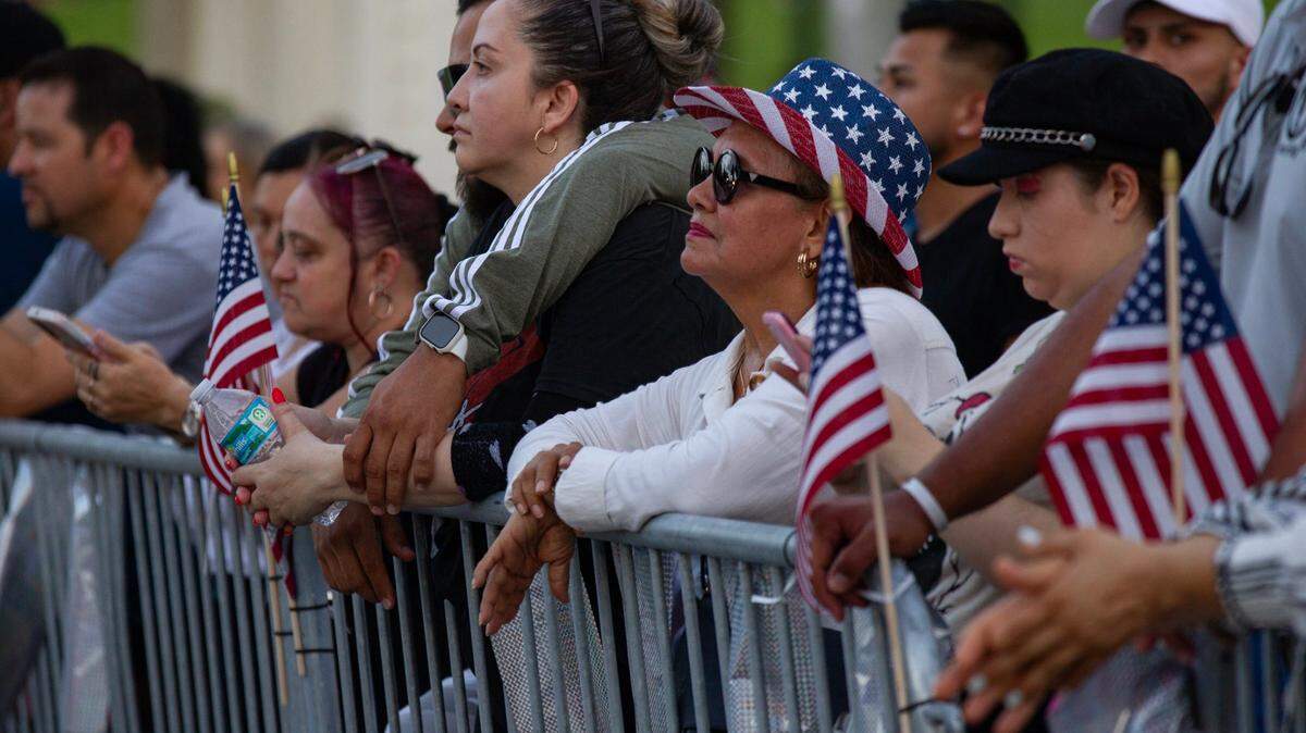 Attendees watch musical performances during the Fourth of July Bayfront Park Celebration at Bayfront Park on Tuesday, July 4, 2023 in Miami, Fla.