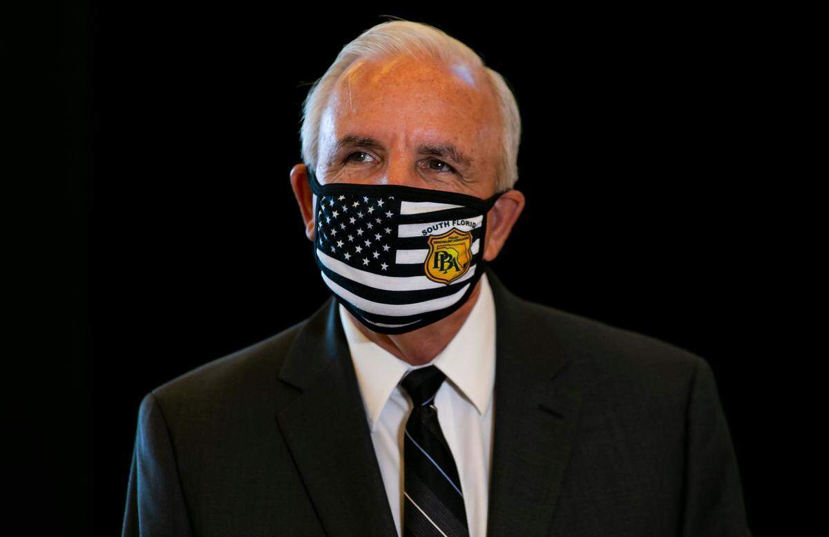 Miami-Dade County Mayor Carlos Gimenez speaks to the media at the Hard Rock Stadium in Miami Gardens on Monday, August 24, 2020. “This is as safe an environment that I’ve ever seen.”