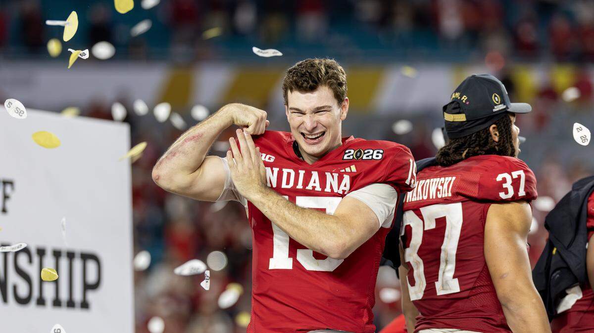 Indiana quarterback Fernando Mendoza (15) greets fans as he celebrates after a 27-21 victory over the Miami Hurricanes in the College Football Playoff national championship game at Hard Rock Stadium on Monday, Jan. 19, 2026, in Miami Gardens, Fla.