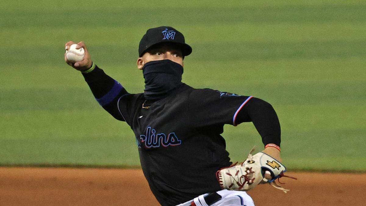 Miami Marlins third baseman Isan Diaz (1) throws to first during the eighth inning of their baseball game against the Atlanta Braves at loanDepot park on Friday, June 11, 2021 in Miami, Florida.