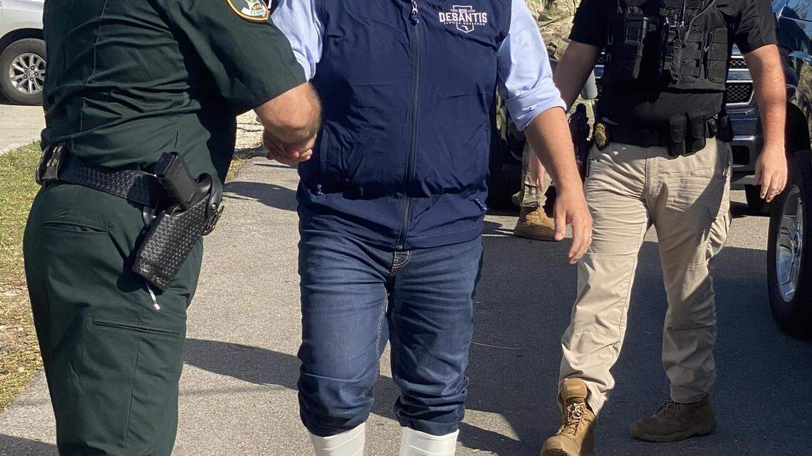 Florida Governor Ron DeSantis’ pristine white boots went viral on social media, where he was both ridiculed, criticized, and praised as he met with DeSoto County Sheriff James Potter while also wearing a campaign jacket, not an official state one, to travel by boat through areas in the county affected by Hurricane Ian.