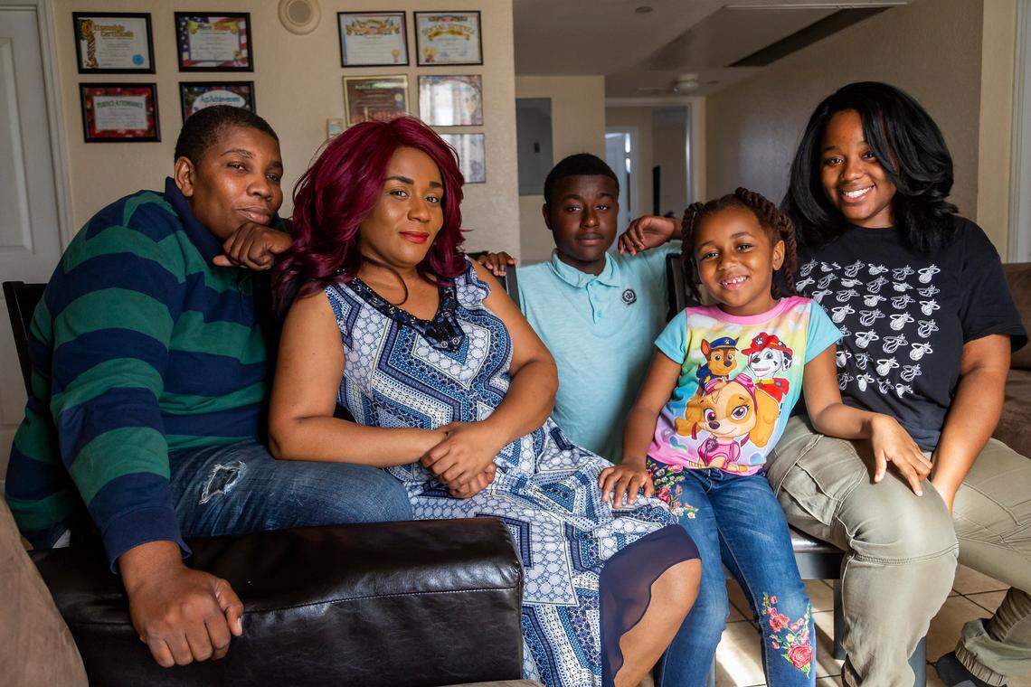 From left to right: Charles Ferguson, 44, Antonese Dorsin, 37, David Desome, 15, Elizabeth Ferguson, 6, and Angel Desome, 18, live in an affordable housing building in Little Havana.