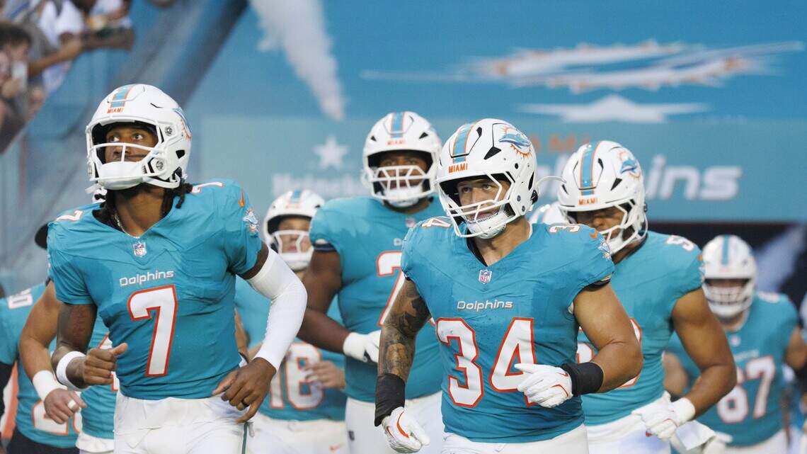 Dolphins player changes positions, beats odds to make team. And news from Hafley