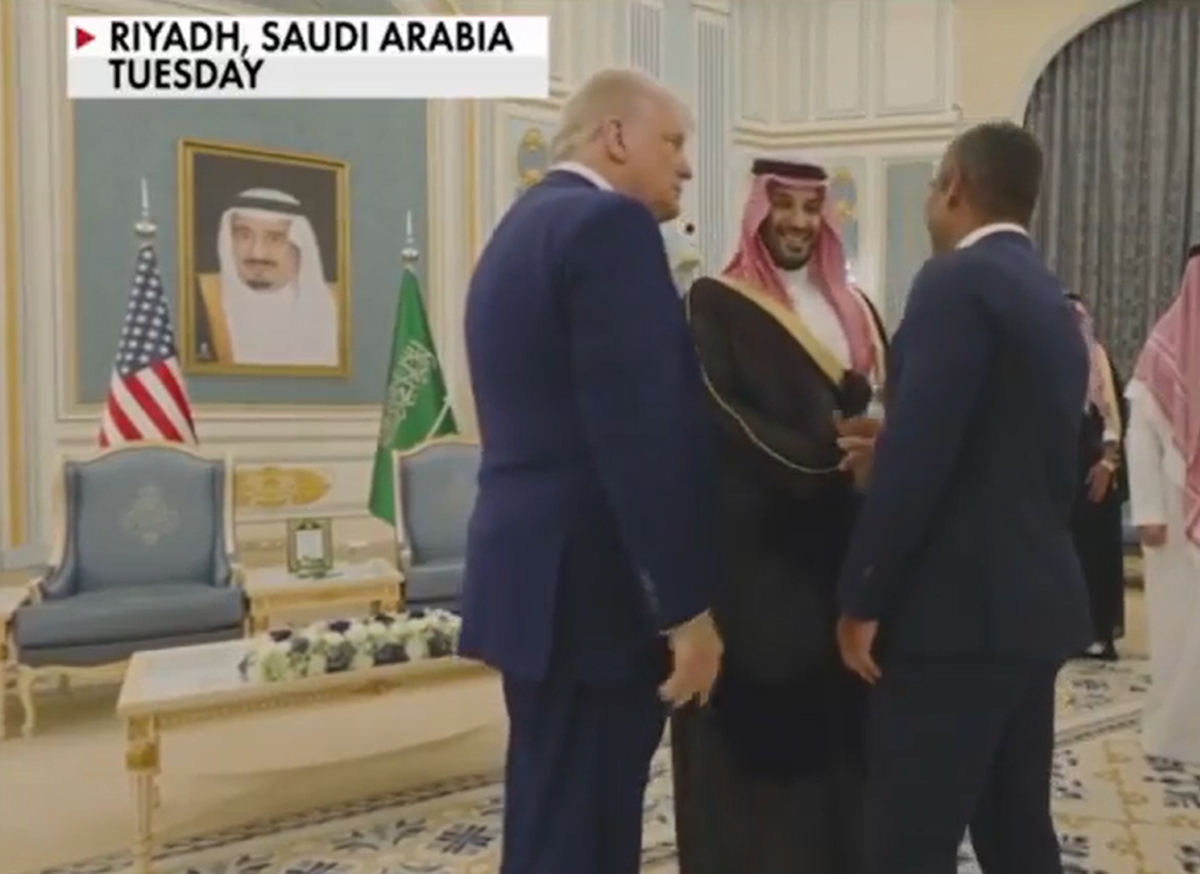 Miami Mayor Francis Suarez, right, shakes hands with Saudi Crown Prince Mohammed bin Salman, center, during an event in Riyadh, Saudi Arabia, on May 13, 2025, as part of a multi-day Middle East tour led by President Trump, left.