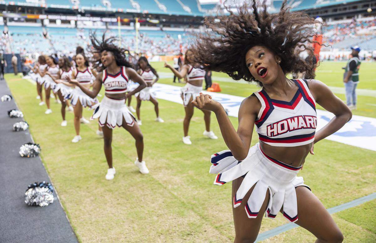 Howard Bison cheerleaders perform as their team plays against Florida A&M Rattlers in the first half of their Orange Blossom Classic football game at Hard Rock Stadium on Saturday, Aug. 30, 2025, in Miami Gardens, Fla.