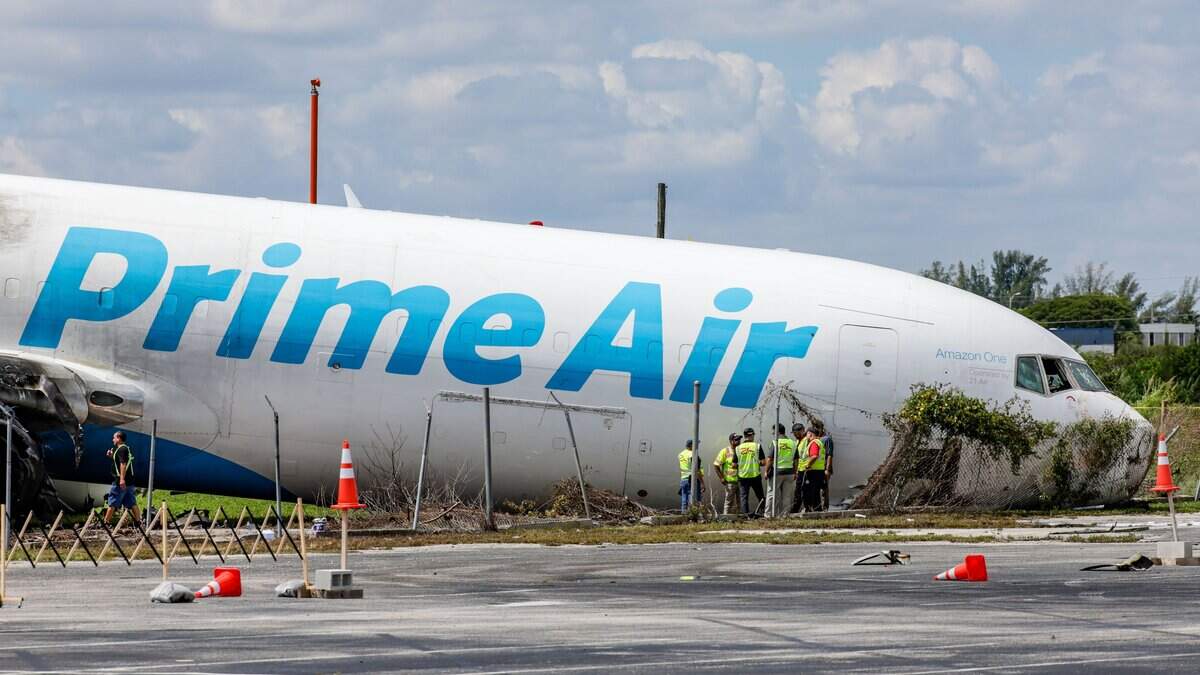 Investigators gather at the crashed plane on Tuesday, Sept. 8, 2026.