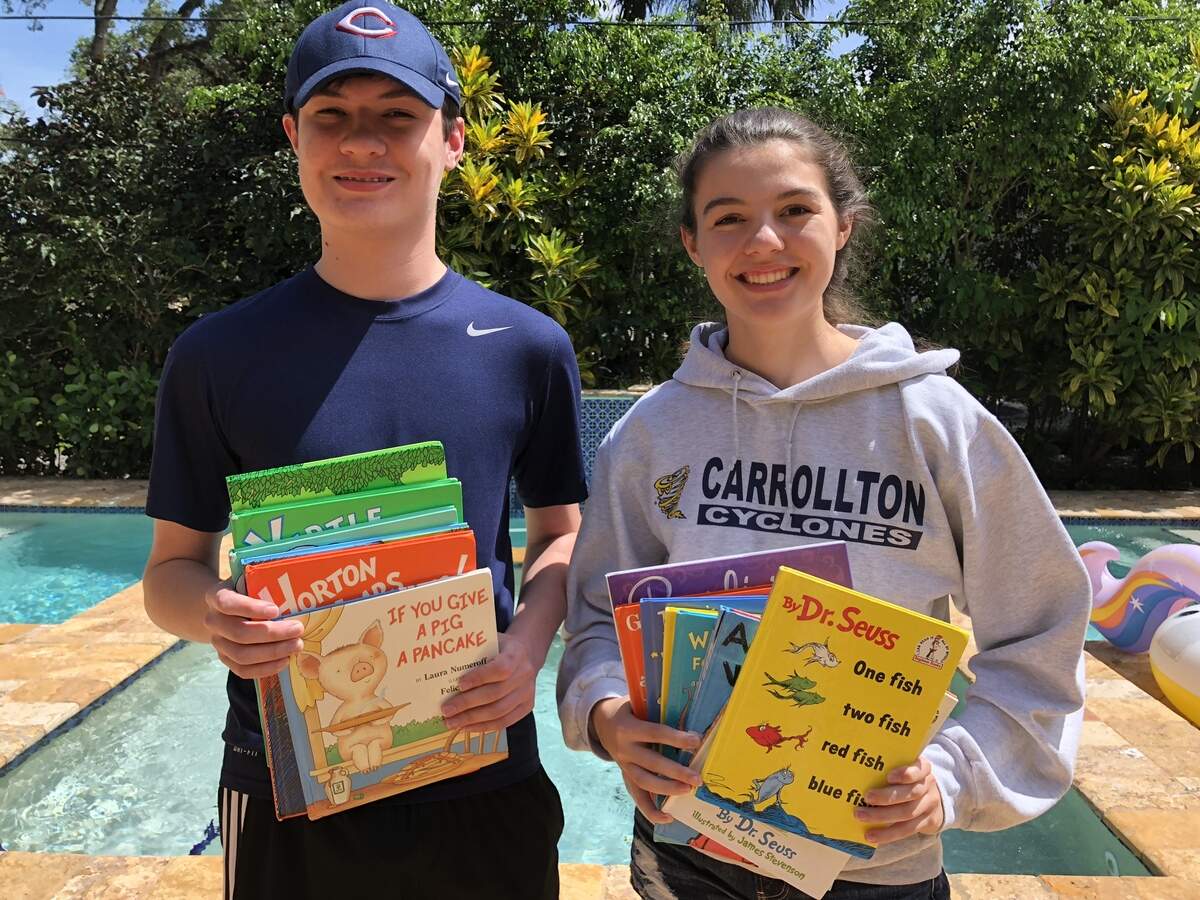 Andrew and Catherine Zurfluh of Coral Gables recently collected more than 1,000 books for the Read to Learn Books for Free initiative, which was created by The Children’s Trust and the Miami Book Fair to ensure all local children have free access to books.