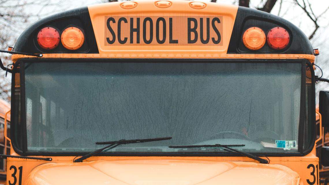The parents were not authorized to be on the bus, the school district said.