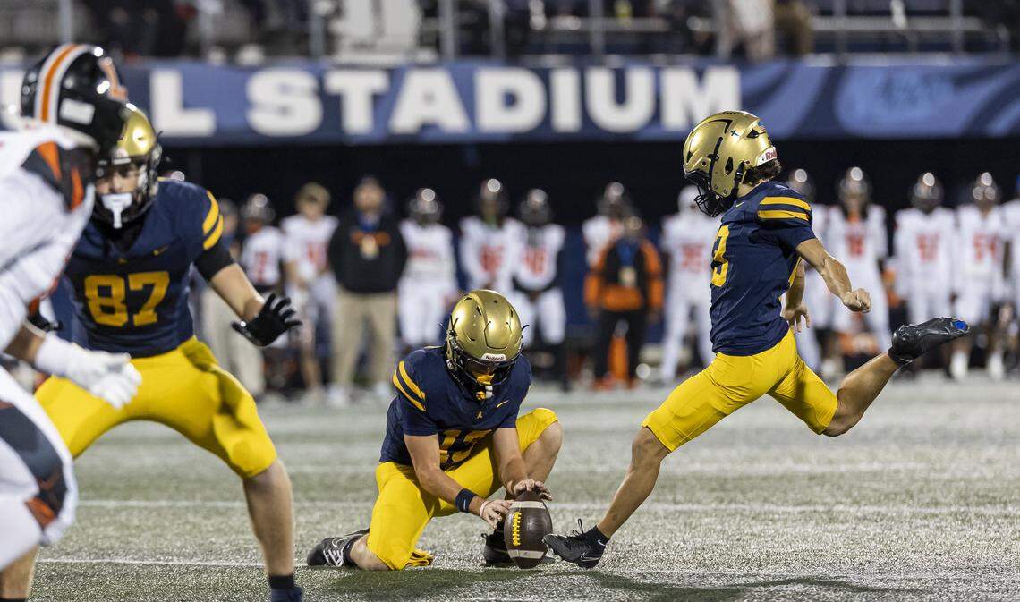 St. Thomas Aquinas Raiders kicker Johnny DiSalvatore (43) kicks a field goal against the Lakeland Dreadnaughts in the first half of their Class 5A state championship football game at Pitbull Stadium on Thursday, Dec. 11, 2025, in Miami, Fla.