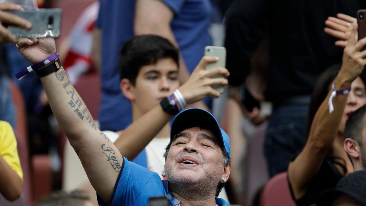 Argentina’s former soccer player Diego Maradona cheers prior to the start of the final match between France and Croatia at the 2018 soccer World Cup in the Luzhniki Stadium in Moscow, Russia, Sunday, July 15, 2018.
