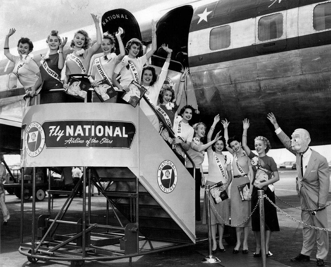 A dozen Esquire calendar models arrive at he Miami airport in 1953.