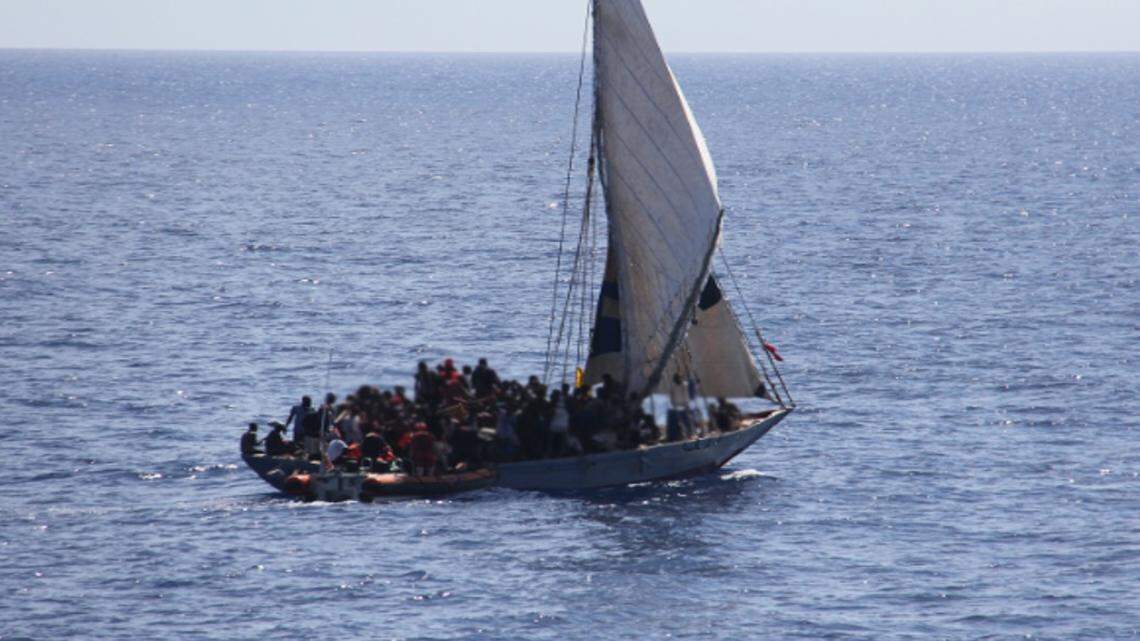 More than 180 people are packed on a Haitian migrant sailboat Sunday, March 5, 2023. The boat was stopped by the U.S. Coast Guard, and the people on board were transferred to Bahamian authorities. 